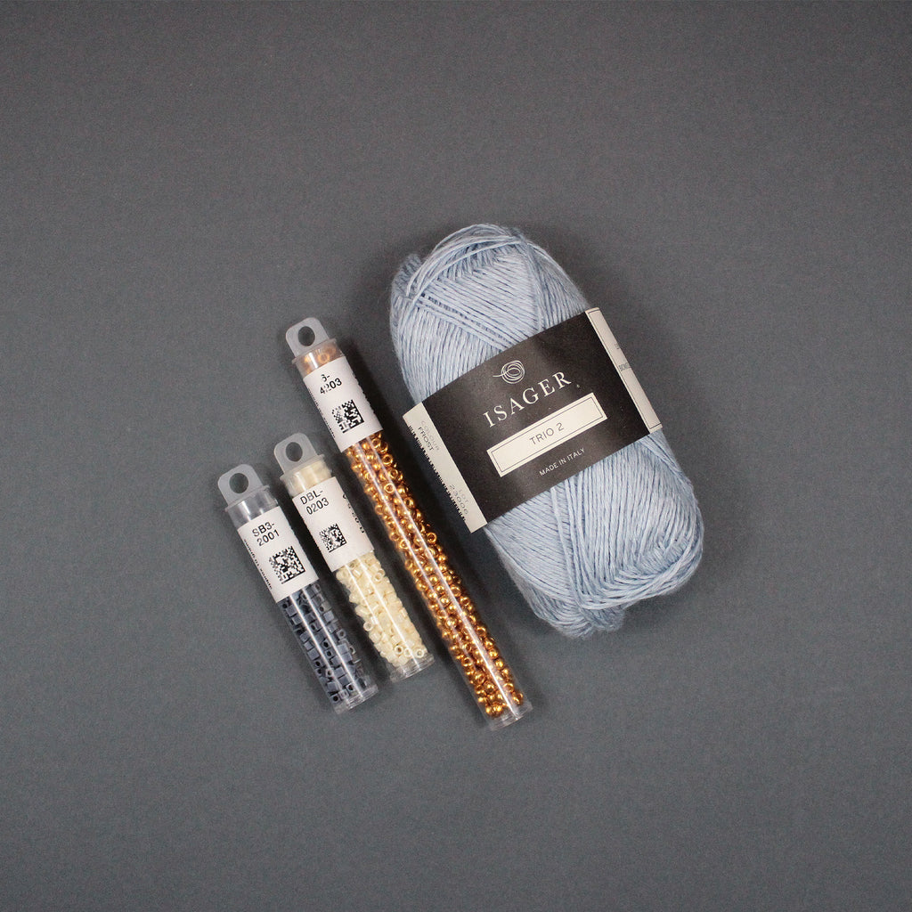 Kit de Hilados "Something on Your Raglan Tee" de Pope Vergara <br> Trio 2 de Isager color Frost