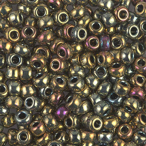 Mostacillas de vidrio japonesas Miyuki calibradas 6/0 de color bronce brillante. Acabado metálico con capa tornasol, ideales para tejido con mostacillas, bordado, aplicaciones costura y bisutería artesanal. Cabeza de Alfiler, Chile.