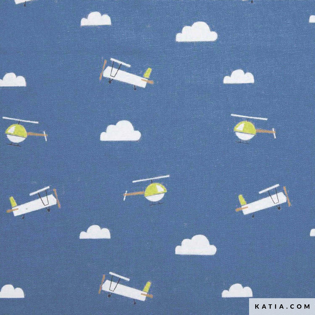 Tela 100% algodón de Katia Fabrics con aspecto denim azul jeans y un divertido estampado infantil de avionetas, helicópteros y nubes, ideal para coser camisas y jardineras.