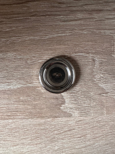 Botón Plateado Grande