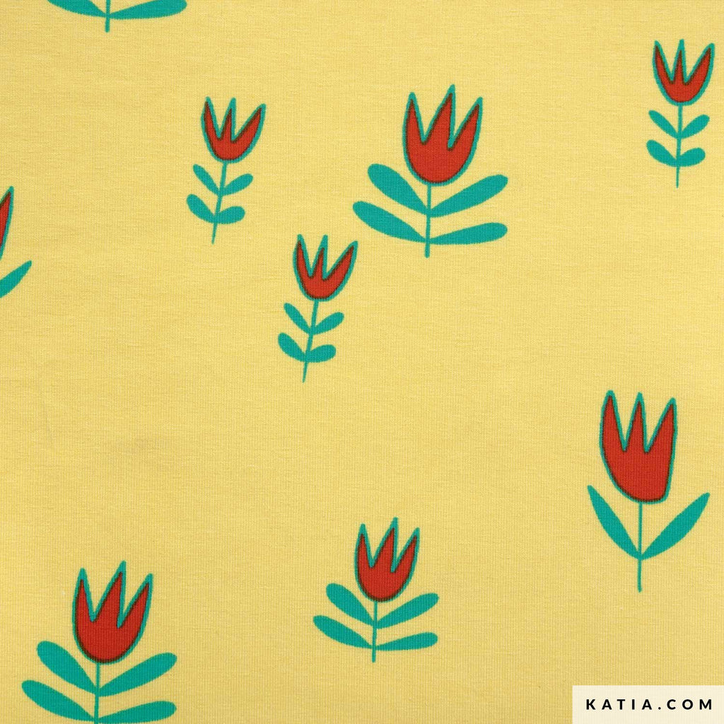 Tela de punto jersey amarilla de Katia Fabrics con un hermoso y vibrante estampado de tulipanes rojos, ideal para confeccionar poleras y ropa cómoda de verano.