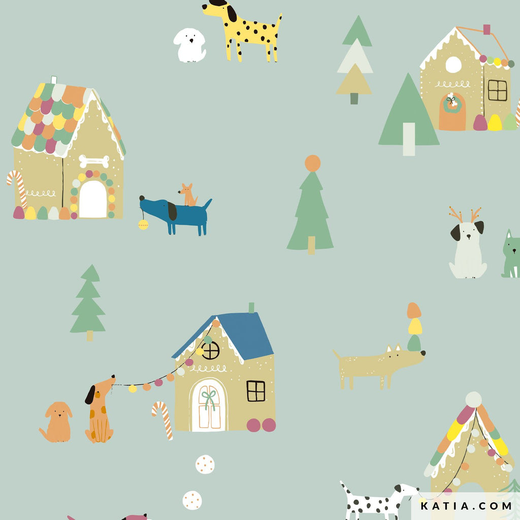 Tela de algodón popelina azul claro de Katia Fabrics con un tierno estampado navideño de perros y casitas decoradas, ideal para coser accesorios festivos y ropa.